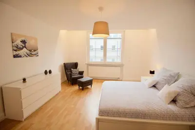 Ein Bett oder Betten in einem Zimmer der Unterkunft Fantastic Apartment in Enchanting Neighbourhood