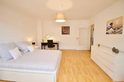 Ein Bett oder Betten in einem Zimmer der Unterkunft Fantastic Apartment in Enchanting Neighbourhood