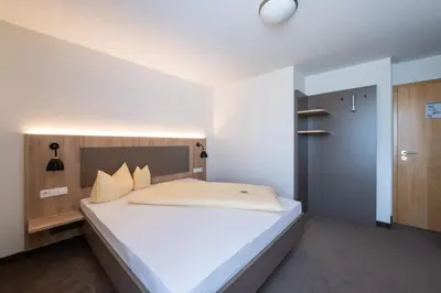 Ein Bett oder Betten in einem Zimmer der Unterkunft Landschloss Korntal
