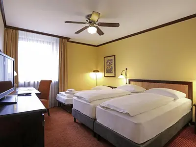 Ein Bett oder Betten in einem Zimmer der Unterkunft Mercure Hotel Frankfurt Airport Langen