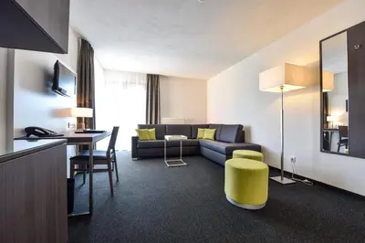 Ein Sitzbereich in der Unterkunft Hotel Vorfelder