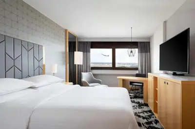 Ein Bett oder Betten in einem Zimmer der Unterkunft Sheraton Frankfurt Airport Hotel & Conference Center