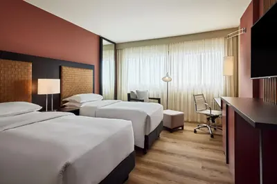 Ein Bett oder Betten in einem Zimmer der Unterkunft Sheraton Frankfurt Airport Hotel & Conference Center