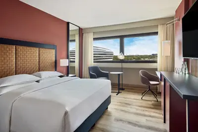 Ein Bett oder Betten in einem Zimmer der Unterkunft Sheraton Frankfurt Airport Hotel & Conference Center