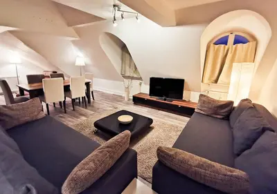 Ein Sitzbereich in der Unterkunft CF26 75m2 Central Quiet Duplex Apartment