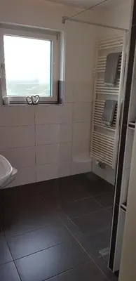 Ein Badezimmer in der Unterkunft Haus Rebenblick