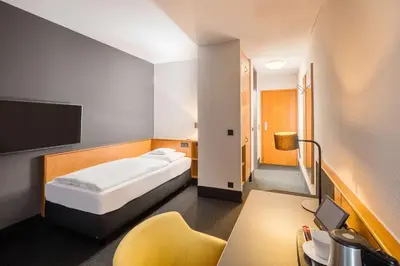Ein Bett oder Betten in einem Zimmer der Unterkunft Best Western Hotel Kaiserslautern