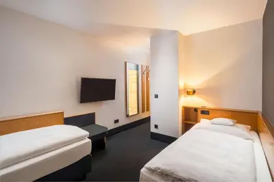 Ein Bett oder Betten in einem Zimmer der Unterkunft Best Western Hotel Kaiserslautern