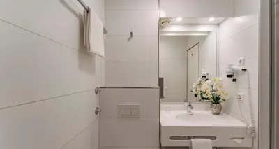 Ein Badezimmer in der Unterkunft PLAZA INN Karlsruhe Nord