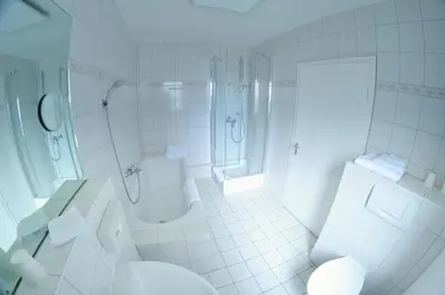 Ein Badezimmer in der Unterkunft Hotel Am Markt