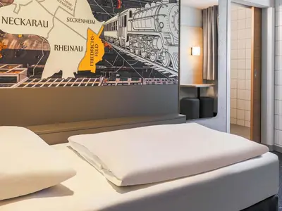 Ein Bett oder Betten in einem Zimmer der Unterkunft B&B Hotel Mannheim-Friedrichsfeld