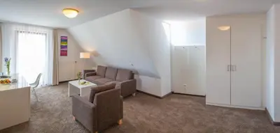 Ein Sitzbereich in der Unterkunft Landidyll Hotel Lamm