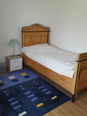 Ein Bett oder Betten in einem Zimmer der Unterkunft Ferienhaus Hedwig