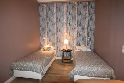 Ein Bett oder Betten in einem Zimmer der Unterkunft Connie's Apartments