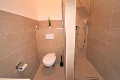 Ein Badezimmer in der Unterkunft Connie's Apartments