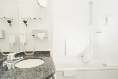 Ein Badezimmer in der Unterkunft Stadthotel Engel