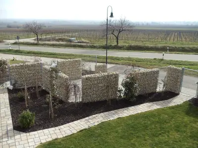 Ein Garten an der Unterkunft Weinhotel Kienle