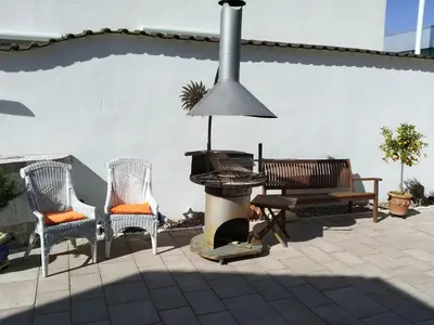 Ein Sitzbereich in der Unterkunft Ferienwohnungen wie im Süden Großostheim