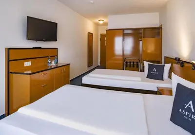 Ein Bett oder Betten in einem Zimmer der Unterkunft Aspire Frankfurt Airport, Trademark Collection by Wyndham