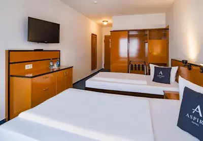 Ein Bett oder Betten in einem Zimmer der Unterkunft Aspire Frankfurt Airport, Trademark Collection by Wyndham
