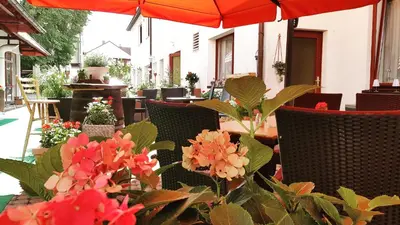 Ein Sitzbereich in der Unterkunft Hotel Zum Löwen