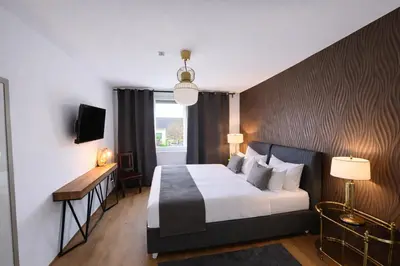 Ein Bett oder Betten in einem Zimmer der Unterkunft Pension Stadt Mannheim