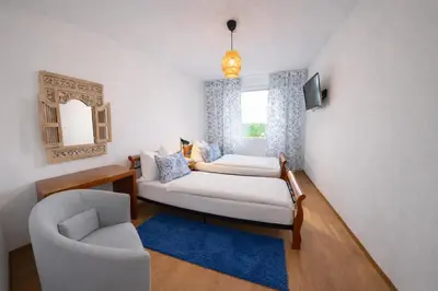 Ein Bett oder Betten in einem Zimmer der Unterkunft Pension Stadt Mannheim