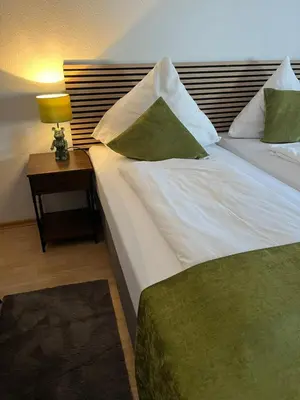 Ein Bett oder Betten in einem Zimmer der Unterkunft Pension Stadt Mannheim