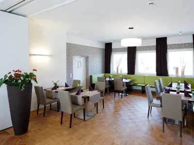 Ein Sitzbereich in der Unterkunft Hotel Karolinger Hof