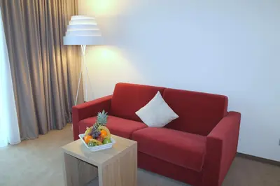 Ein Sitzbereich in der Unterkunft Best Western Queens Hotel Pforzheim-Niefern