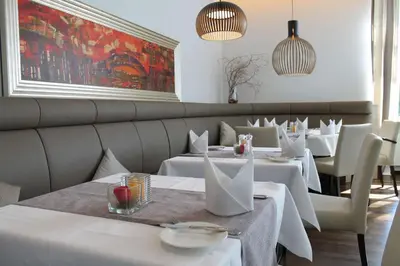 Ein Sitzbereich in der Unterkunft Best Western Queens Hotel Pforzheim-Niefern