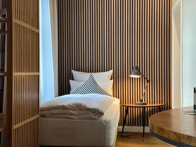 Ein Bett oder Betten in einem Zimmer der Unterkunft Hotel Zur Alten Brücke