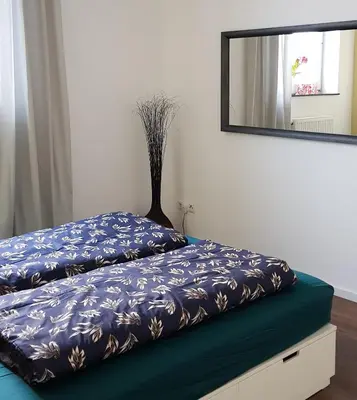 Ein Bett oder Betten in einem Zimmer der Unterkunft Bismarck-Apartment