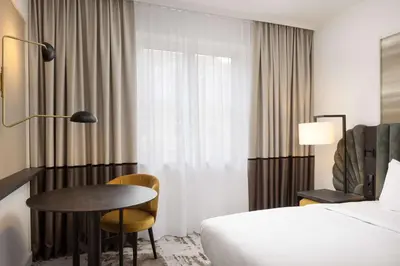 Ein Bett oder Betten in einem Zimmer der Unterkunft Hilton Heidelberg