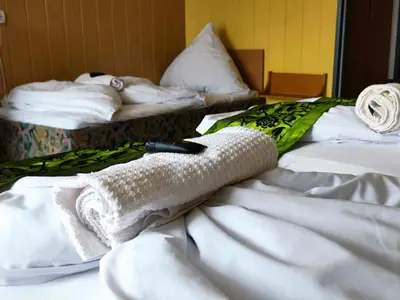 Ein Bett oder Betten in einem Zimmer der Unterkunft City Hotel Pforzheim