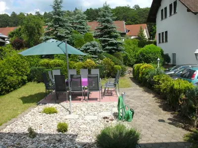 Ein Garten an der Unterkunft Hotel Tannenhof
