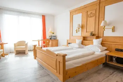 Ein Bett oder Betten in einem Zimmer der Unterkunft AAAA Hotelwelt KÜBLER