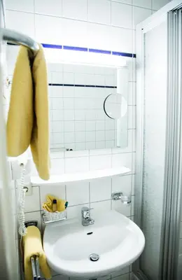 Ein Badezimmer in der Unterkunft Hotel am Rathaus