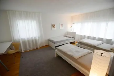 Ein Bett oder Betten in einem Zimmer der Unterkunft WeinheimResidence
