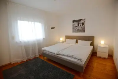Ein Bett oder Betten in einem Zimmer der Unterkunft WeinheimResidence