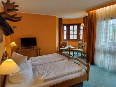 Ein Bett oder Betten in einem Zimmer der Unterkunft Hotel Hirsch