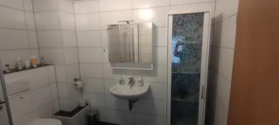 Ein Badezimmer in der Unterkunft Haus Kunterbunt