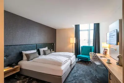Ein Bett oder Betten in einem Zimmer der Unterkunft Best Western Plus Palatin Kongresshotel