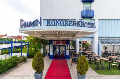 Ein Restaurant oder anderes Speiselokal in der Unterkunft Best Western Plus Palatin Kongresshotel