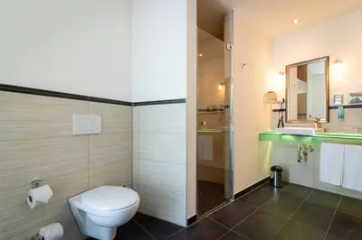Ein Badezimmer in der Unterkunft Best Western Plus Palatin Kongresshotel