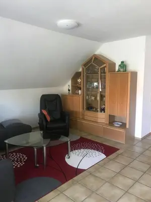 Ein Sitzbereich in der Unterkunft Ahorn 11