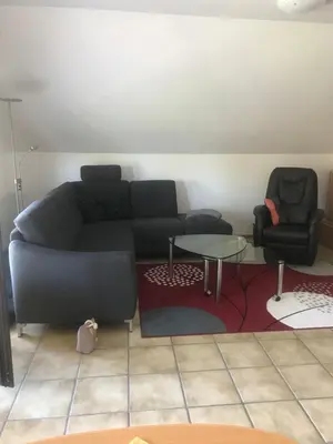 Ein Sitzbereich in der Unterkunft Ahorn 11