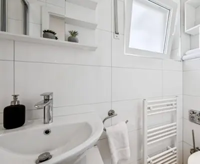 Ein Badezimmer in der Unterkunft Prime Host Balcony Apartment