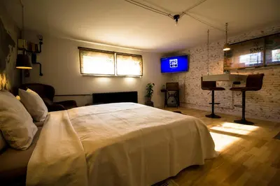 Ein Bett oder Betten in einem Zimmer der Unterkunft Little Beauty Souterrain Apartment Linkenheim