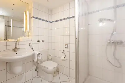 Ein Badezimmer in der Unterkunft Parkhotel Atlantic
